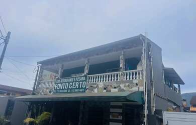 Imagem: A casa possui 2 Dormitórios, 2 Banheiros, 2 Vagas na garagem