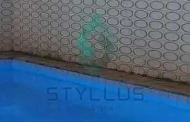 Imagem: A casa possui 4 Dormitórios, 5 Banheiros, 3 Vagas na garagem