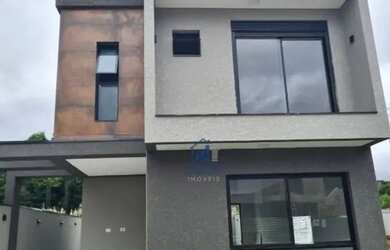 Imagem: A casa possui 3 Dormitórios, 3 Banheiros, 2 Vagas na garagem