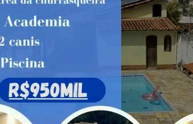 Imagem: A casa possui 4 Dormitórios, 3 Banheiros, 5 Vagas na garagem