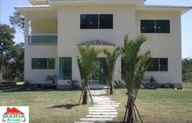 Imagem: A casa possui 4 Dormitórios, 5 Banheiros, 4 Vagas na garagem