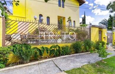 Imagem: A casa possui 5 Dormitórios, 5 Banheiros, 5 Vagas na garagem