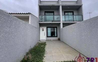 Imagem: A casa possui 2 Dormitórios, 3 Banheiros, 1 Vaga na garagem