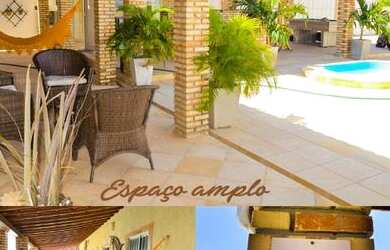 Imagem: A casa possui 3 Dormitórios, 3 Banheiros, 5 Vagas na garagem