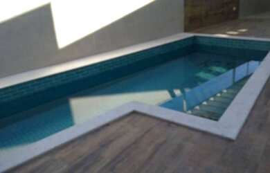 Imagem: A casa possui 4 Dormitórios, 5 Banheiros, 3 Vagas na garagem