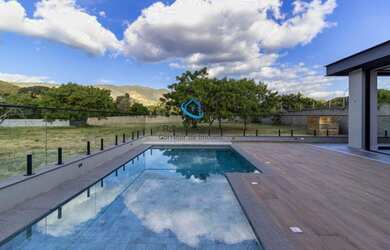 Imagem: A casa em condomínio possui 3 Dormitórios, 5 Banheiros, 4