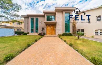 Imagem: A casa em condomínio possui 5 Dormitórios, 5 Banheiros, 5