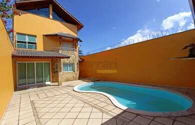 Imagem: A casa possui 3 Dormitórios, 5 Banheiros, 5 Vagas na garagem