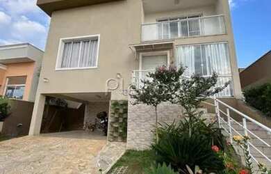 Imagem: A casa em condomínio possui 4 Dormitórios, 5 Banheiros, 1