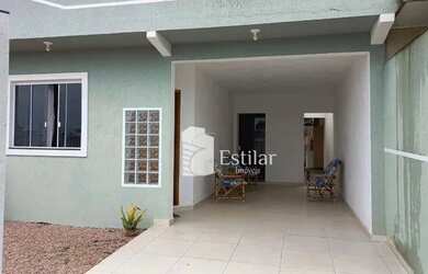 Imagem: A casa possui 3 Dormitórios, 2 Banheiros, 3 Vagas na garagem