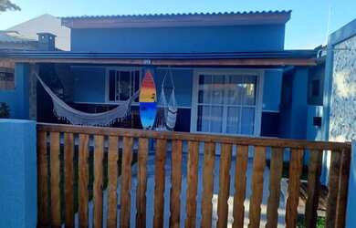 Imagem: A casa possui 2 Dormitórios, 1 Banheiro, 1 Vaga na garagem