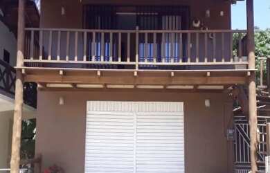 Imagem: A casa possui 3 Dormitórios, 2 Banheiros, 1 Vaga na garagem