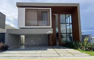 Imagem: A casa em condomínio possui 4 Dormitórios, 5 Banheiros, 4