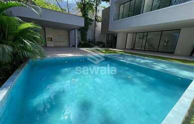 Imagem: A casa possui 5 Dormitórios, 5 Banheiros, 4 Vagas na garagem