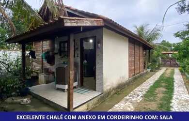 Imagem: A casa possui 3 Dormitórios, 2 Banheiros, 4 Vagas na garagem