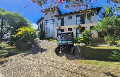 Imagem: A casa em condomínio possui 5 Dormitórios, 5 Banheiros, 5