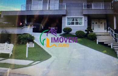 Imagem: A casa em condomínio possui 5 Dormitórios, 5 Banheiros, 3