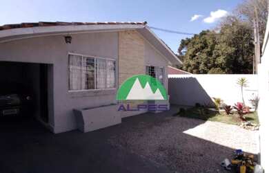 Imagem: A casa possui 3 Dormitórios, 2 Banheiros, 3 Vagas na garagem