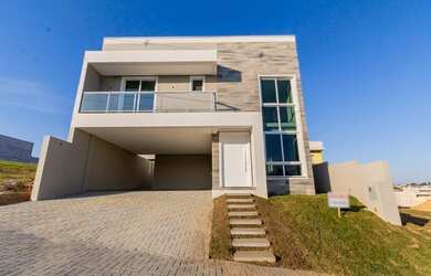 Imagem: A casa em condomínio possui 3 Dormitórios, 3 Banheiros, 4