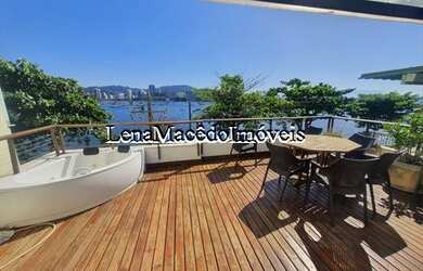 Imagem: A casa possui 5 Dormitórios, 4 Banheiros, 2 Vagas na garagem