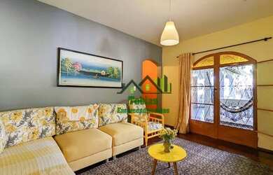 Imagem: A casa possui 3 Dormitórios, 4 Banheiros, 5 Vagas na garagem