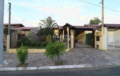 Imagem: A casa possui 2 Dormitórios, 3 Banheiros, 2 Vagas na garagem