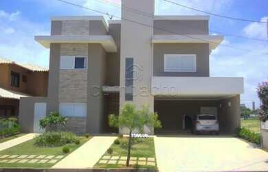 Imagem: A casa em condomínio possui 4 Dormitórios, 5 Banheiros, 4