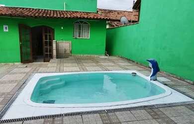 Imagem: A casa possui 3 Dormitórios, 3 Banheiros, 5 Vagas na garagem