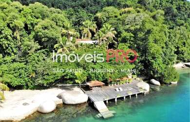 Imagem: A casa possui 4 Dormitórios, 5 Banheiros, 5 Vagas na garagem