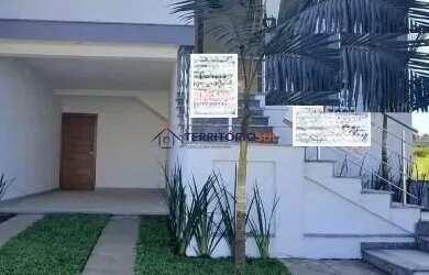 Imagem: A casa possui 3 Dormitórios, 1 Banheiro, 2 Vagas na garagem