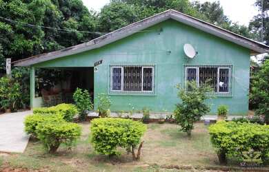 Imagem: A casa possui 2 Dormitórios, 1 Banheiro, 2 Vagas na garagem