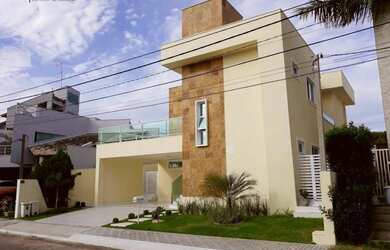 Imagem: A casa em condomínio possui 4 Dormitórios, 5 Banheiros, 4