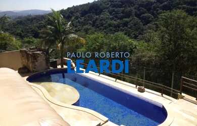 Imagem: A casa em condomínio possui 5 Dormitórios, 5 Banheiros, 5