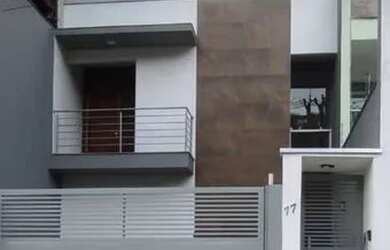 Imagem: A casa possui 3 Dormitórios, 2 Banheiros, 2 Vagas na garagem