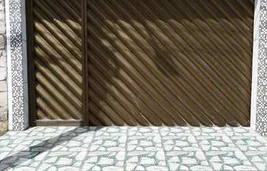 Imagem: A casa possui 2 Dormitórios, 2 Banheiros, 3 Vagas na garagem