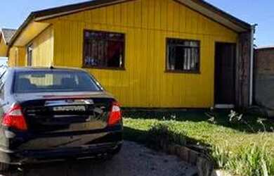 Imagem: A casa possui 4 Dormitórios, 2 Banheiros, 4 Vagas na garagem