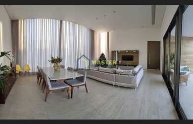 Imagem: A casa possui 4 Dormitórios, 5 Banheiros, 4 Vagas na garagem