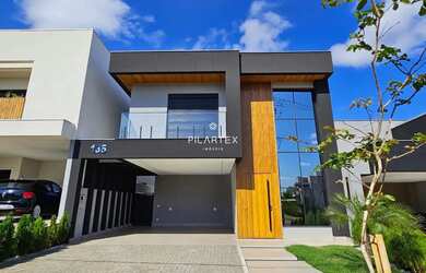 Imagem: A casa possui 3 Dormitórios, 4 Banheiros, 4 Vagas na garagem