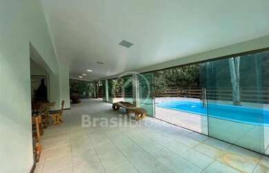 Imagem 13: Casa com 5 quartos e piscina e sauna