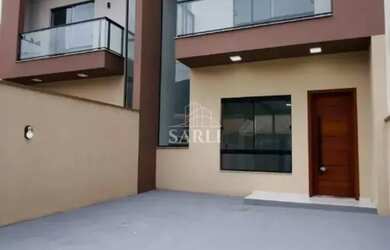 Imagem: A casa possui 2 Dormitórios, 3 Banheiros, 2 Vagas na garagem