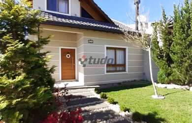 Imagem: A casa possui 3 Dormitórios, 3 Banheiros, 2 Vagas na garagem