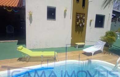 Imagem: A casa possui 5 Dormitórios, 3 Banheiros, 3 Vagas na garagem