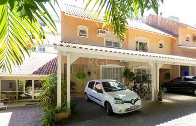 Imagem: A casa em condomínio possui 3 Dormitórios, 3 Banheiros, 2