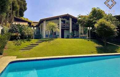 Imagem: A casa em condomínio possui 5 Dormitórios, 5 Banheiros, 5