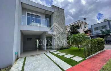 Imagem: A casa possui 3 Dormitórios, 5 Banheiros, 2 Vagas na garagem