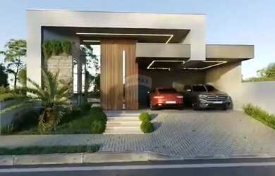 Imagem: A casa possui 3 Dormitórios, 4 Banheiros, 2 Vagas na garagem