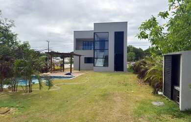 Imagem: A casa em condomínio possui 4 Dormitórios, 5 Banheiros, 3