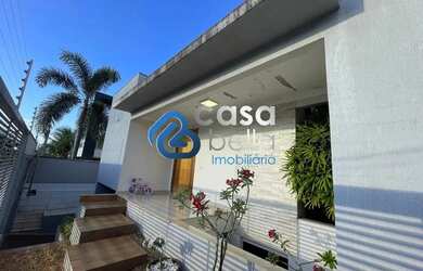 Imagem: A casa possui 3 Dormitórios, 5 Banheiros, 5 Vagas na garagem