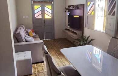 Imagem: A casa possui 2 Dormitórios e 1 Banheiro e está localizado