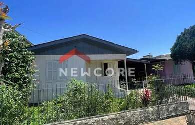 Imagem: A casa possui 3 Dormitórios, 3 Banheiros, 3 Vagas na garagem